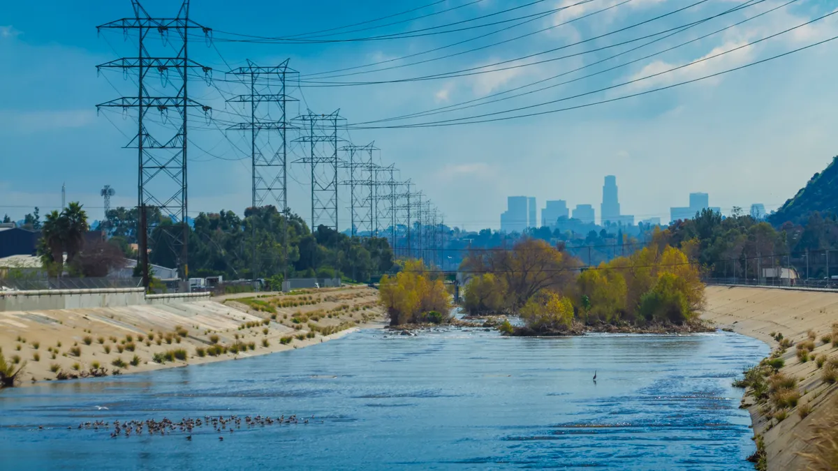 Transmission lines running next to the Los Angeles River in California.