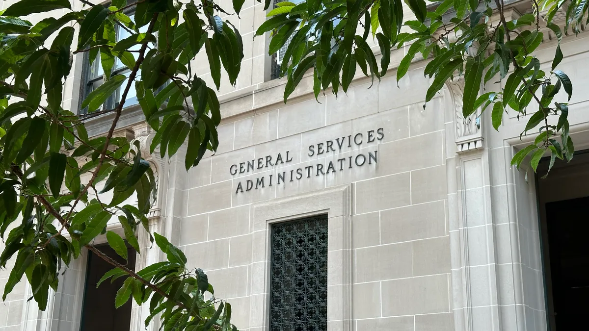 A facade of a building with the General Services Administration signboard